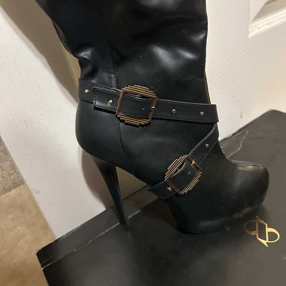 Knee high black boots